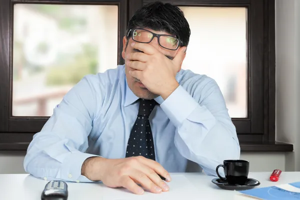 depositphotos_46138865-stock-photo-desperate-man-in-the-office